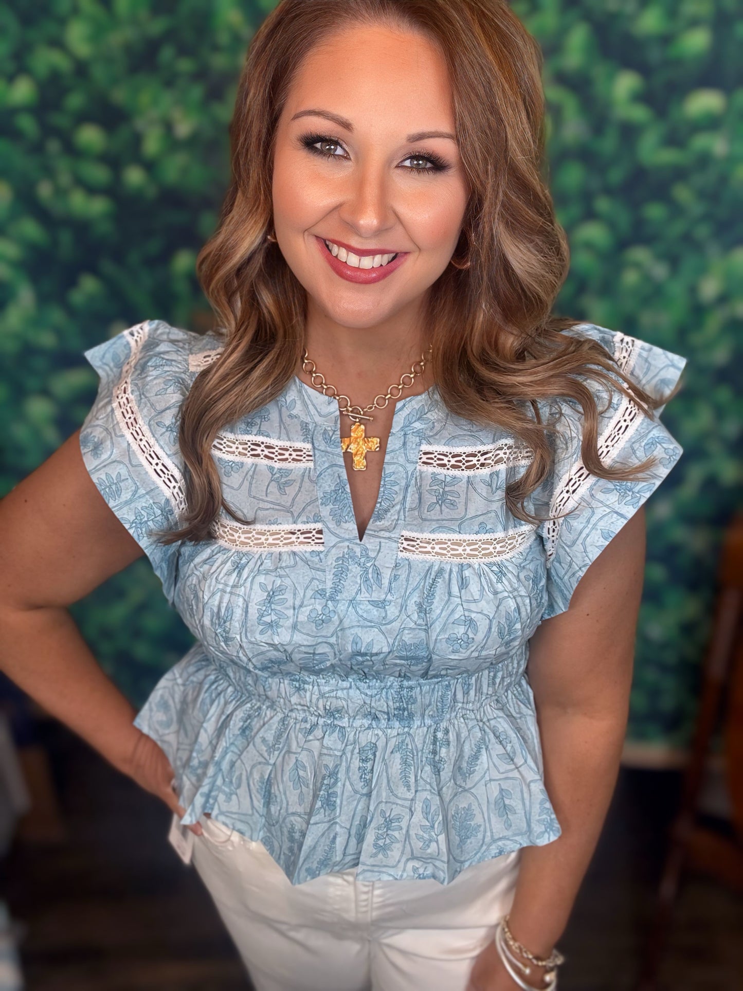Blue flutter sleeve top