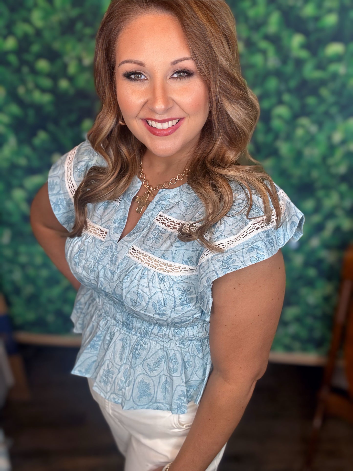 Blue flutter sleeve top