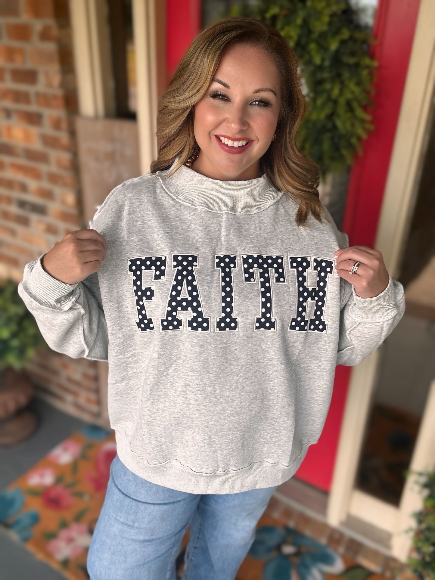 FAITH polka dot mock neck sweatshirt