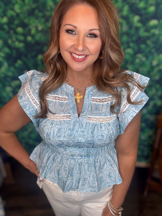 Blue flutter sleeve top