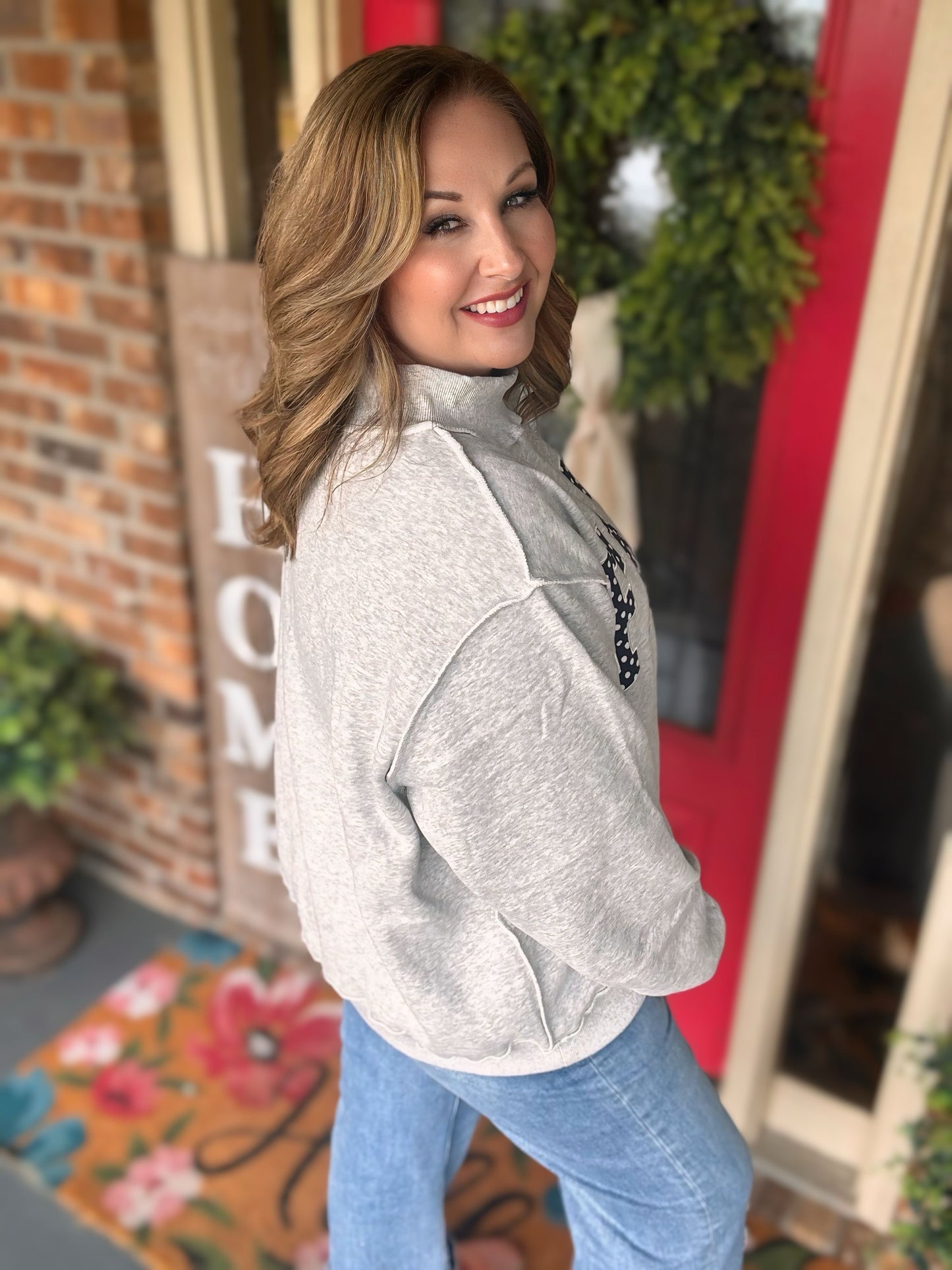 FAITH polka dot mock neck sweatshirt